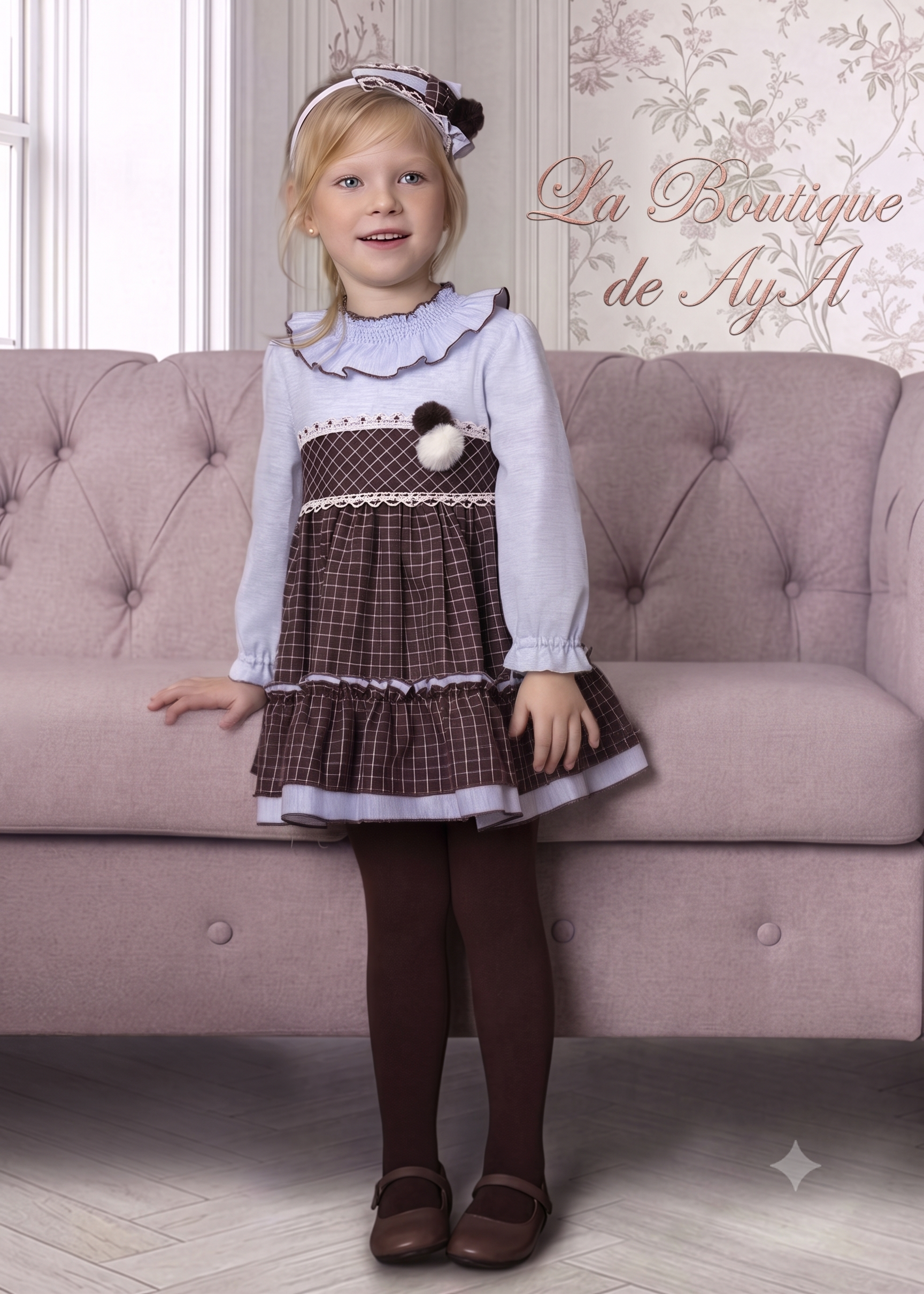 Niña luciendo el vestido elegante de invierno en marrón y azul celeste con falda de cuadros de la firma española Miranda