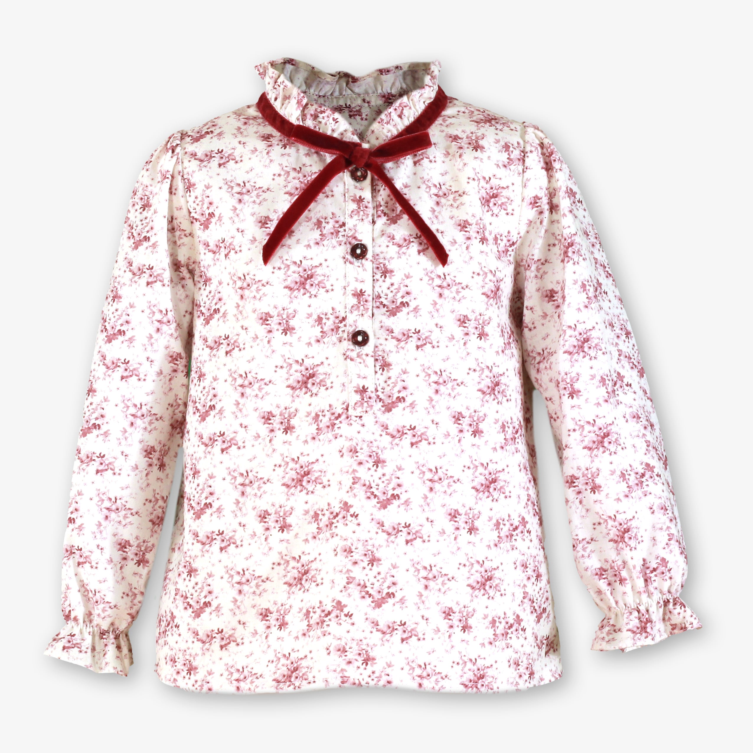 Blusa infantil para niña de estampado floral con cuello de volante y lazo de terciopelo granate firma Miranda