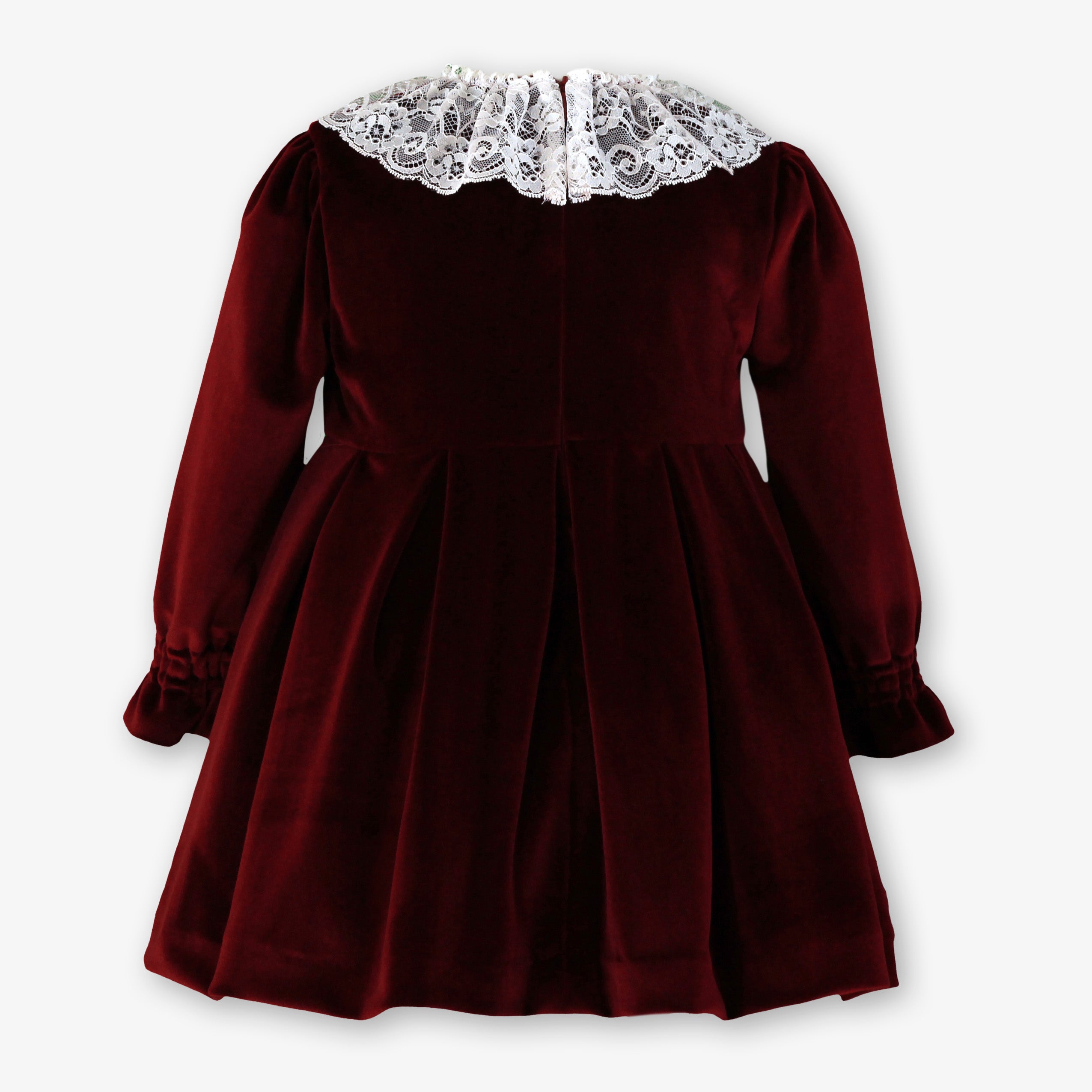 Vista posterior con pliegues del vestido de terciopelo granate para niña marca Miranda