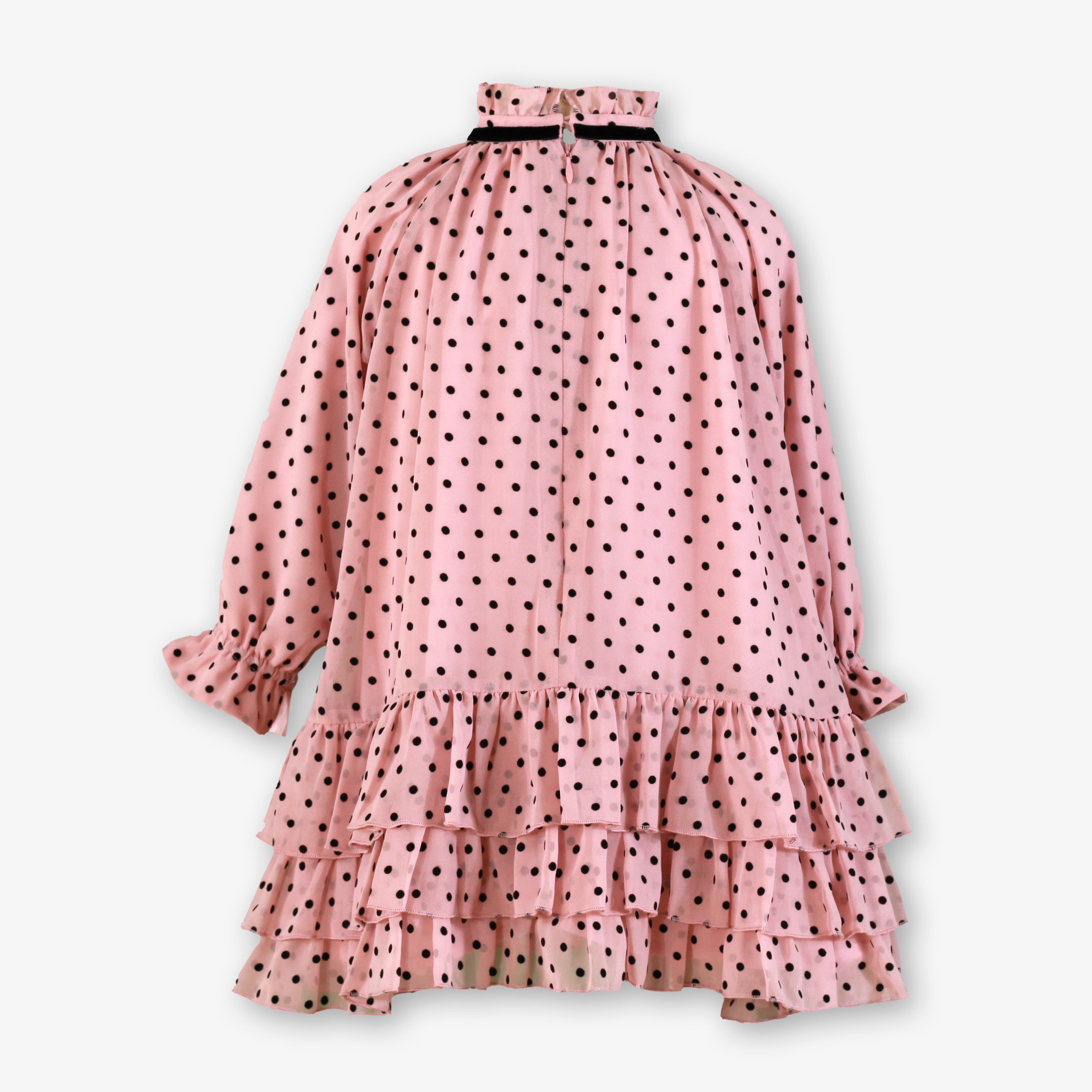 Vista trasera del vestido fluido rosa palo con lunares negros para niña de la firma Miranda