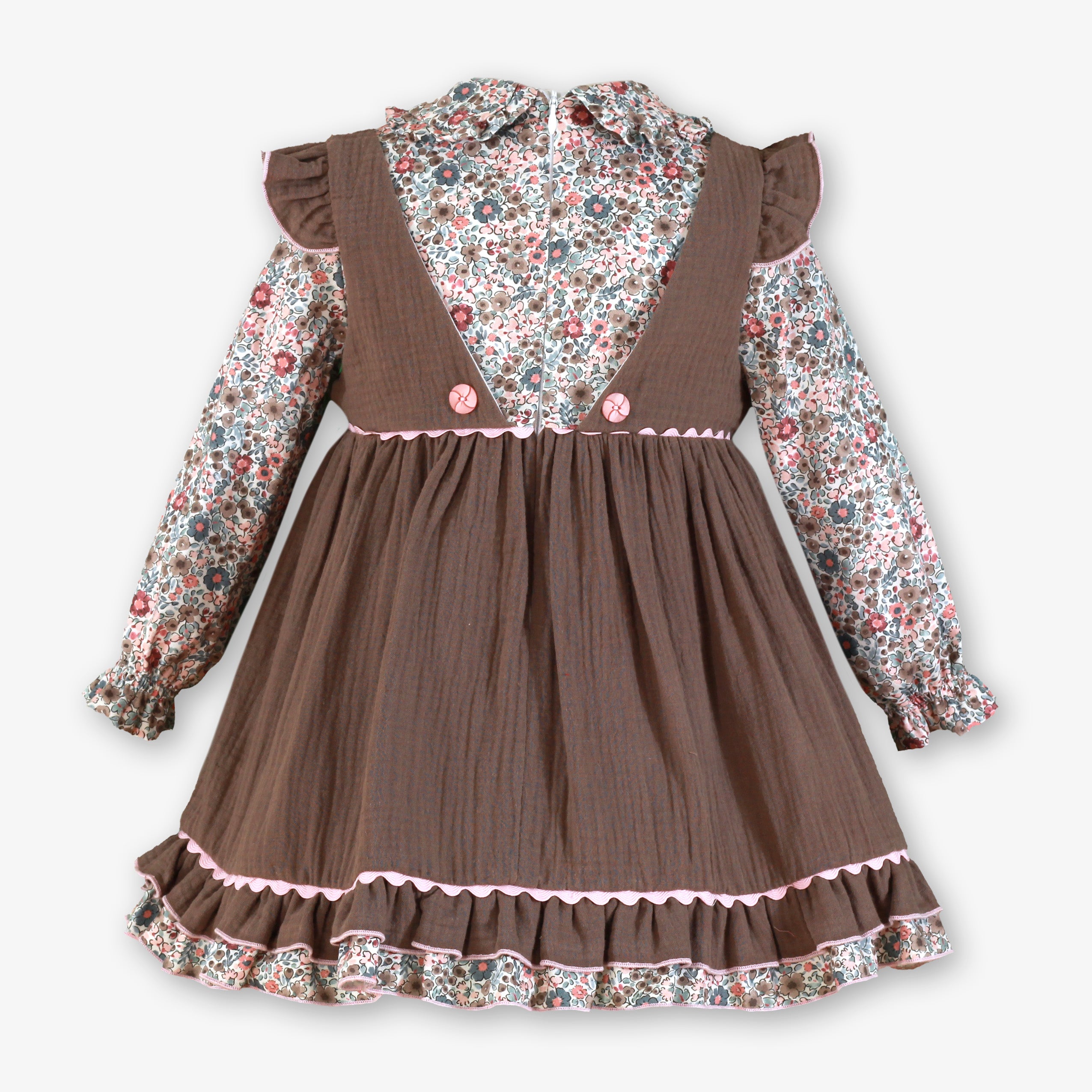 Vista posterior con tirantes escotados y botones del vestido marrón con blusa floral para niña de la firma Miranda