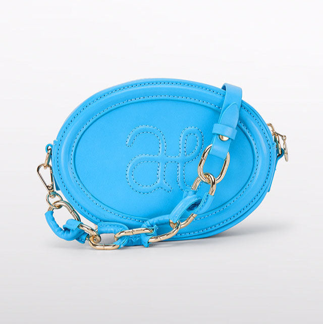 Bolso logo cadena turquesa Abel y Lula 5457 - La boutique de AyA Abel y Lula