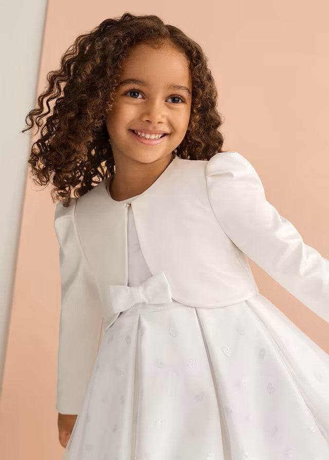 Chaqueta de niña nacarada color nata de Abel y Lula