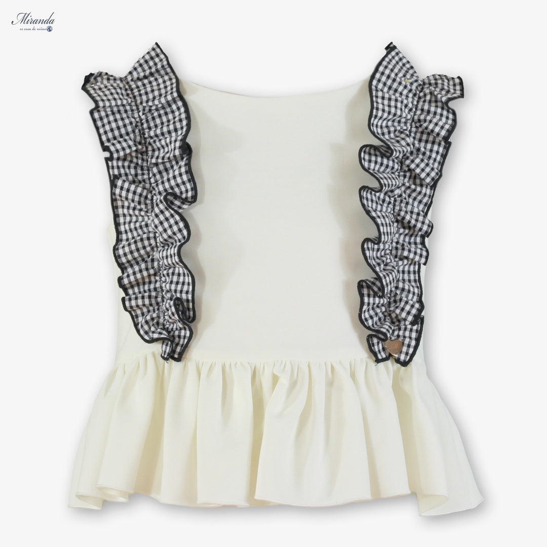 Top niña blanco con volantes del conjunto Miranda.
