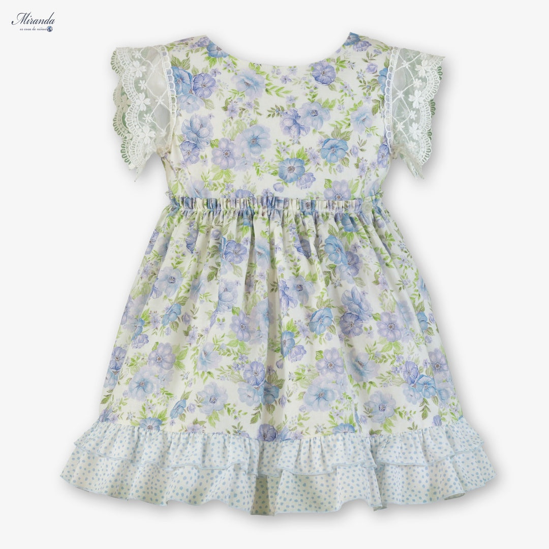 Vestido de ceremonia para niña con estampado floral azul y mangas de encaje, marca Miranda – verano 2026
