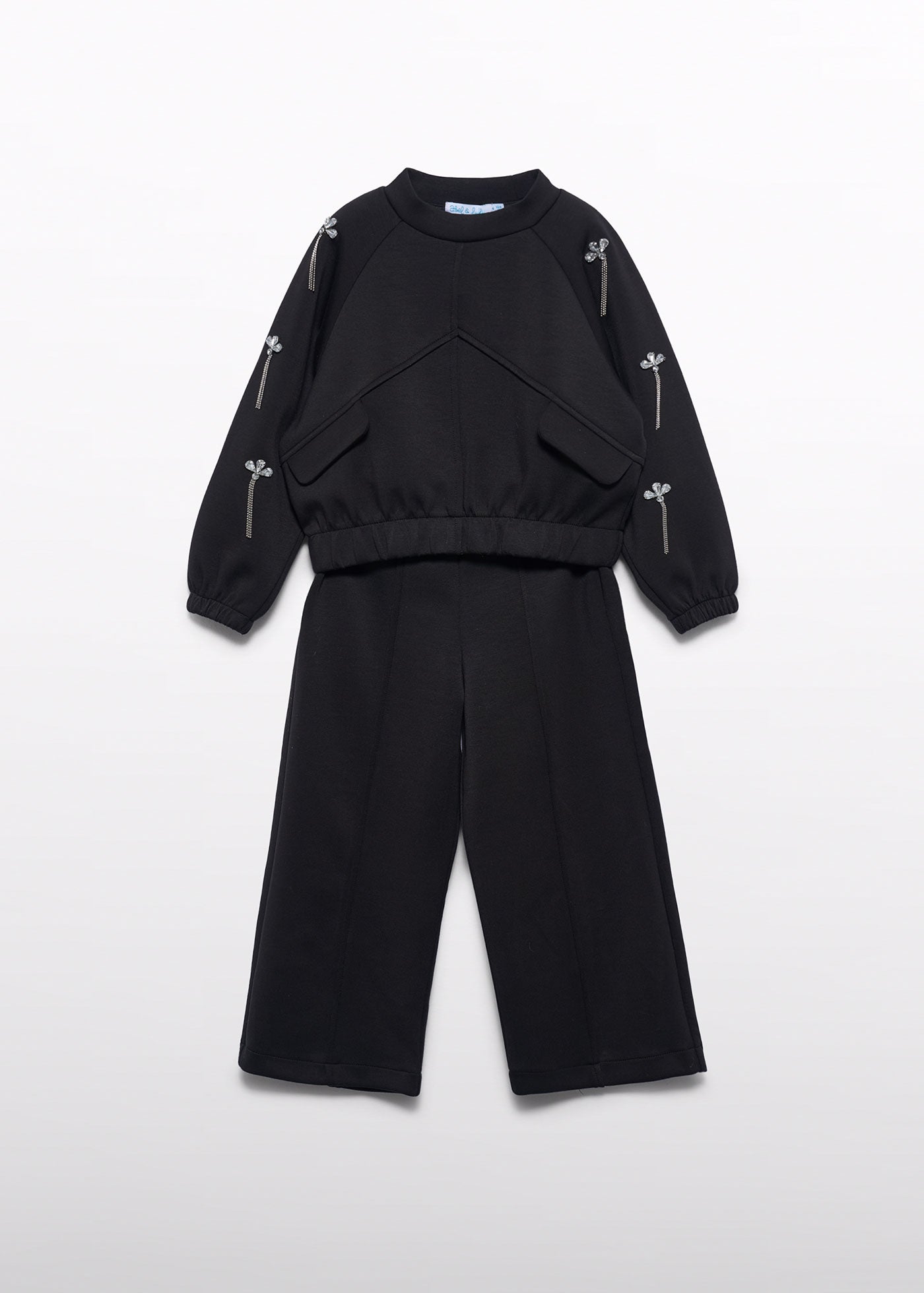 Conjunto pantalón punto joya negro para niña Abel & Lula 05772