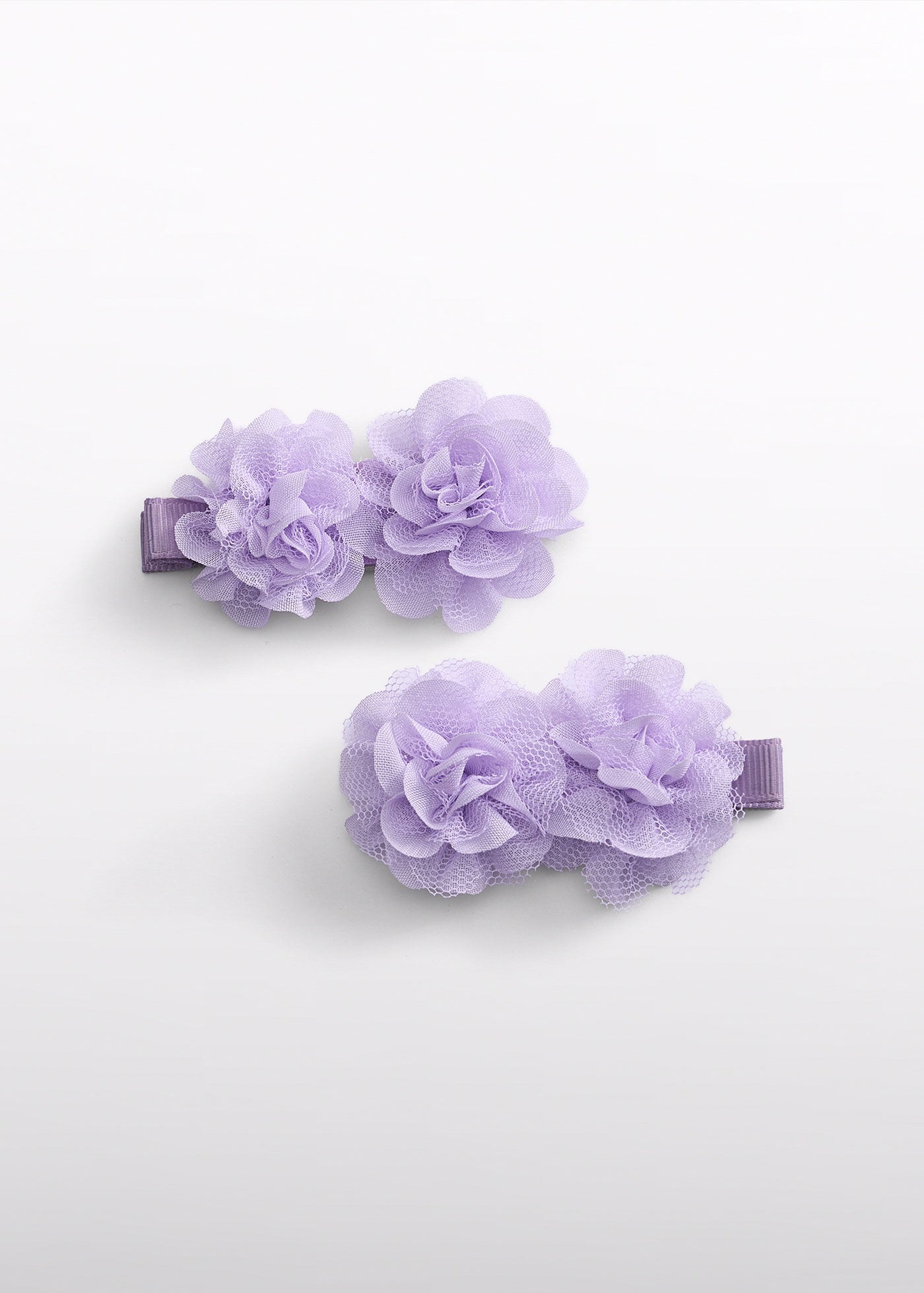 Pinza flores lila para niña Abel & Lula 05917