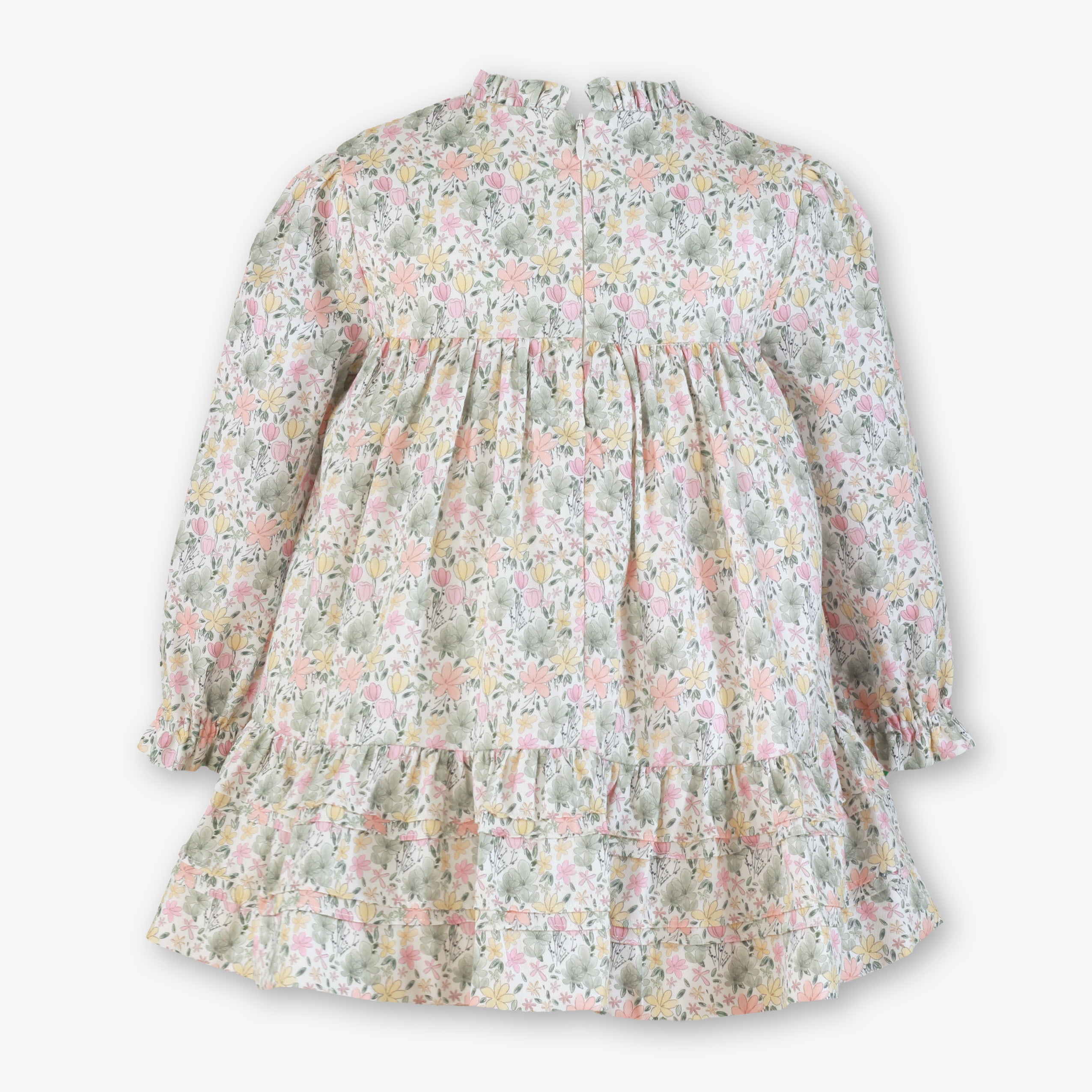 Vista posterior con cremallera invisible del vestido floral para niña firma Miranda