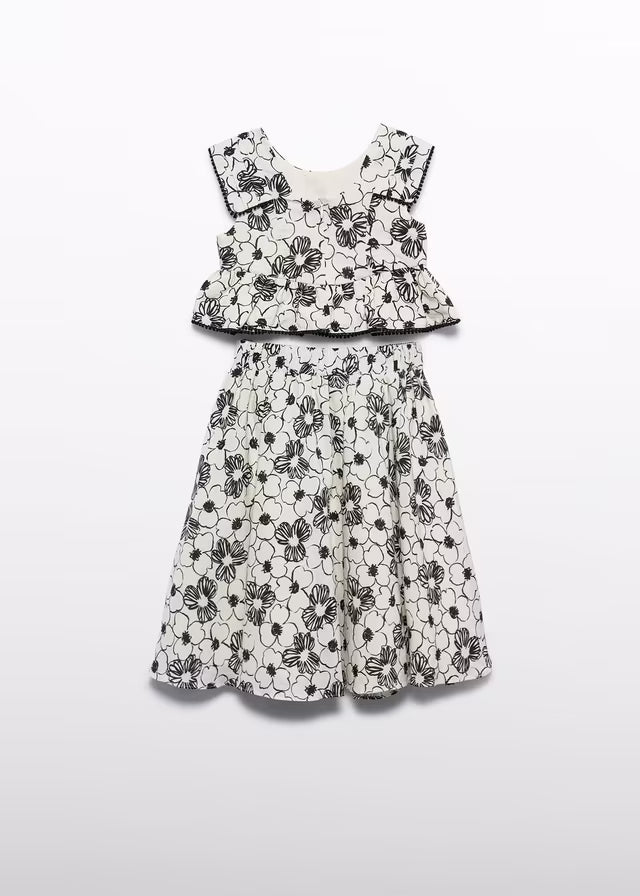 “Conjunto Abel & Lula visto por detrás con falda midi estampada y top a juego, SKU 05063.”

