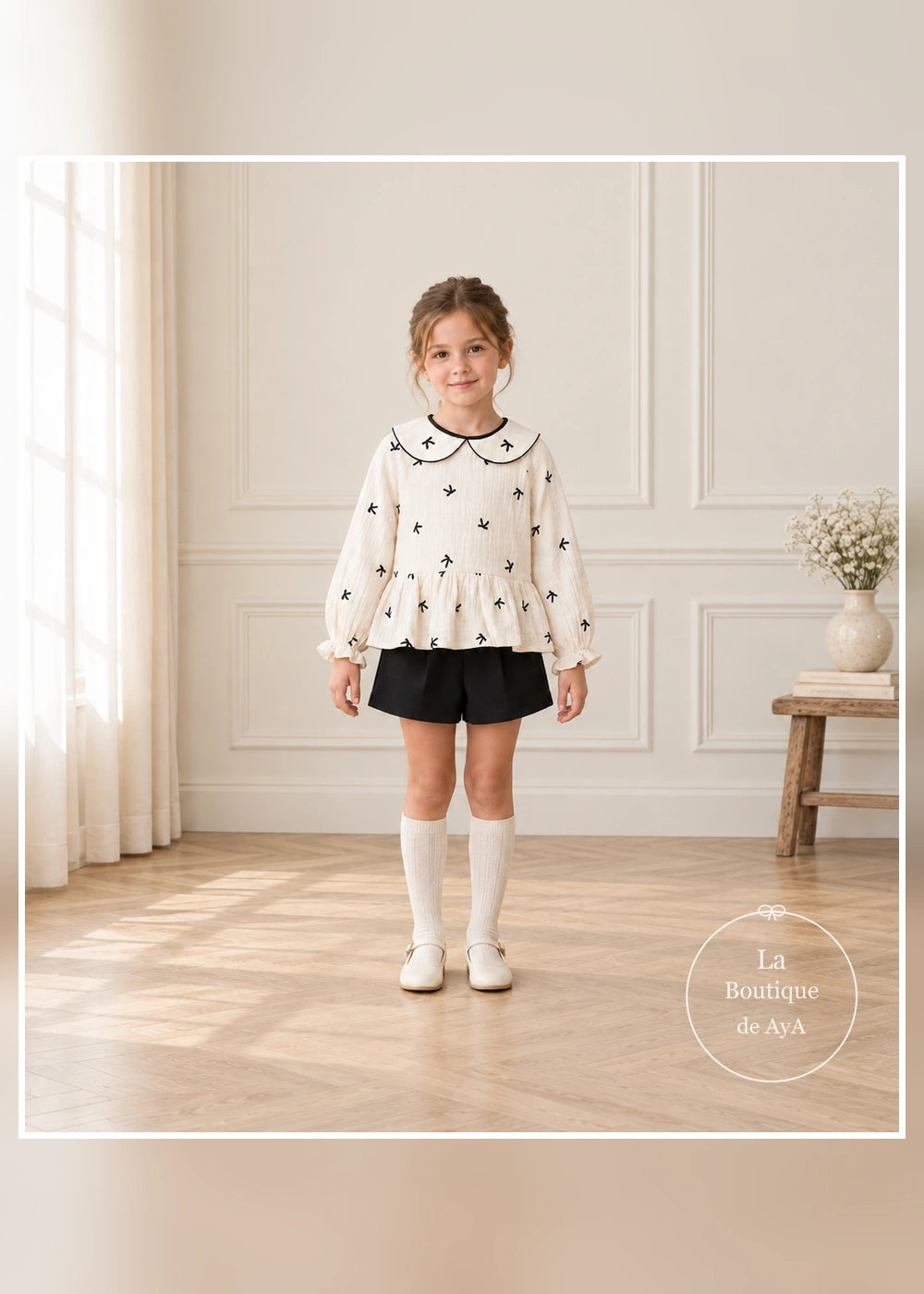 Conjunto de blusa de lazos y falda pantalón negra para niña Mayoral, vista frontal