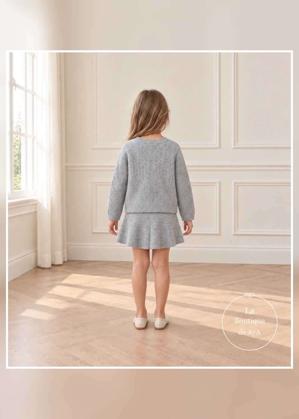 Conjunto de jersey y falda de punto con perlas gris para niña Mayoral, vista trasera