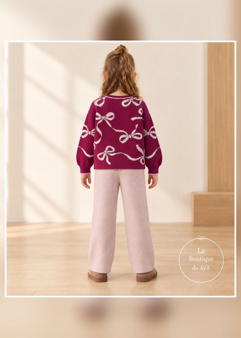 Conjunto de punto lazos framboise para niña Mayoral 04527: vista posterior con modelo