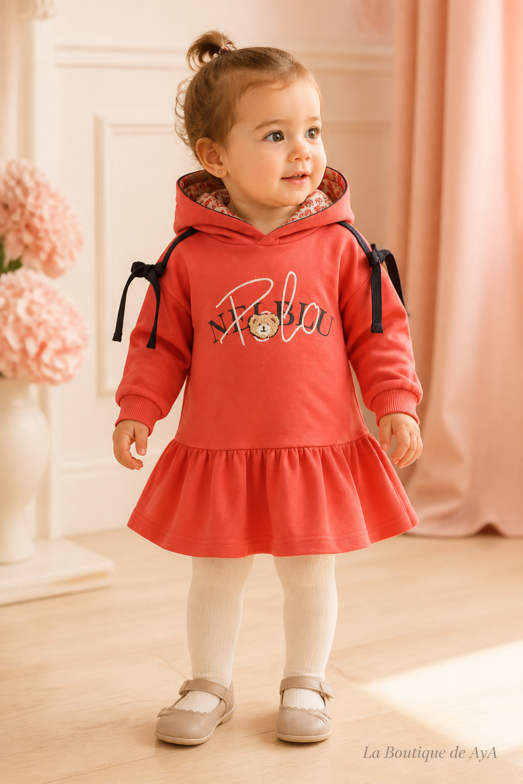 Vestido bebé niña Miranda coral 40/1201/V con modelo