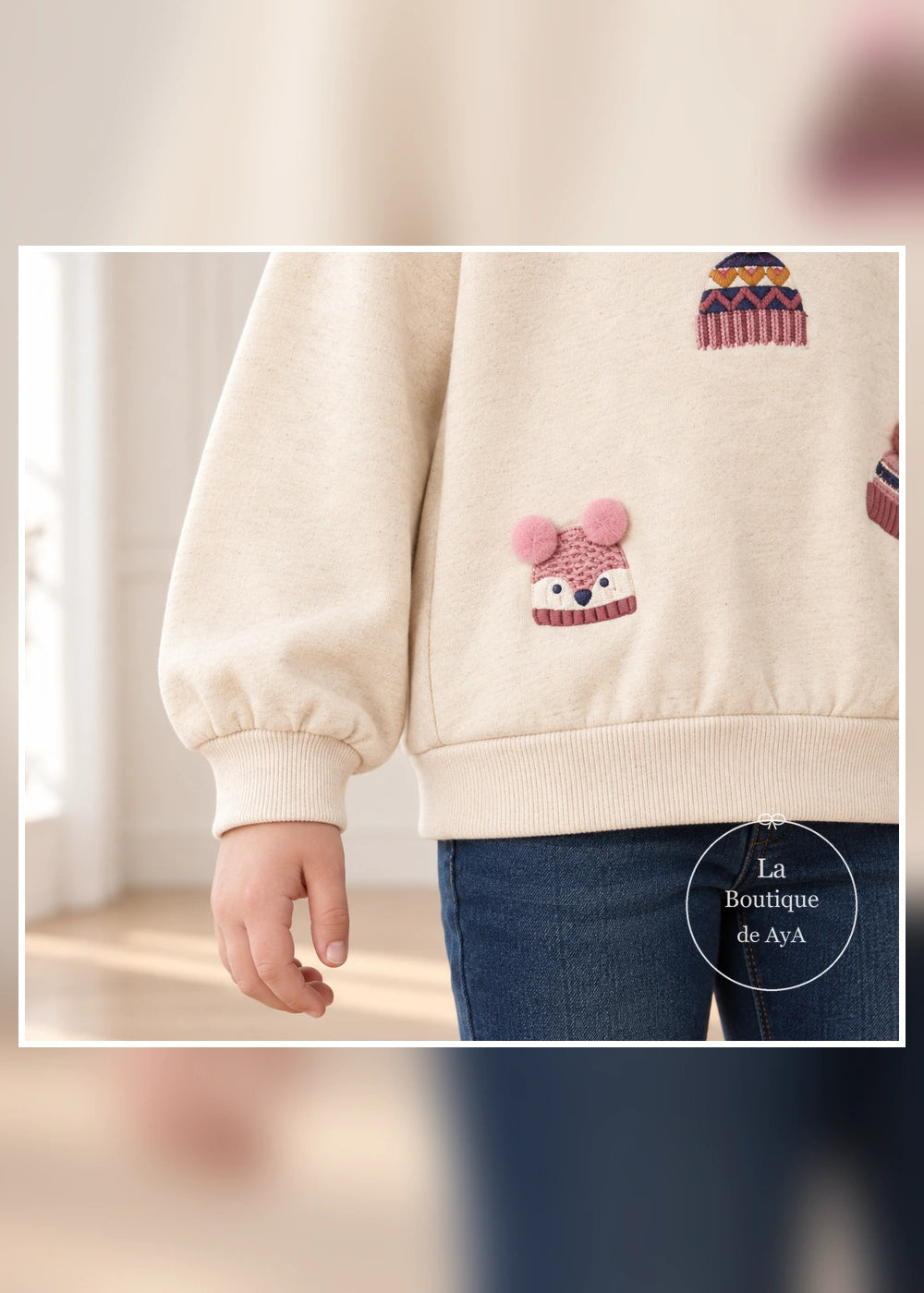 Pullover bordado de gorritos semilla para niña Mayoral, detalle del tejido y los acabados