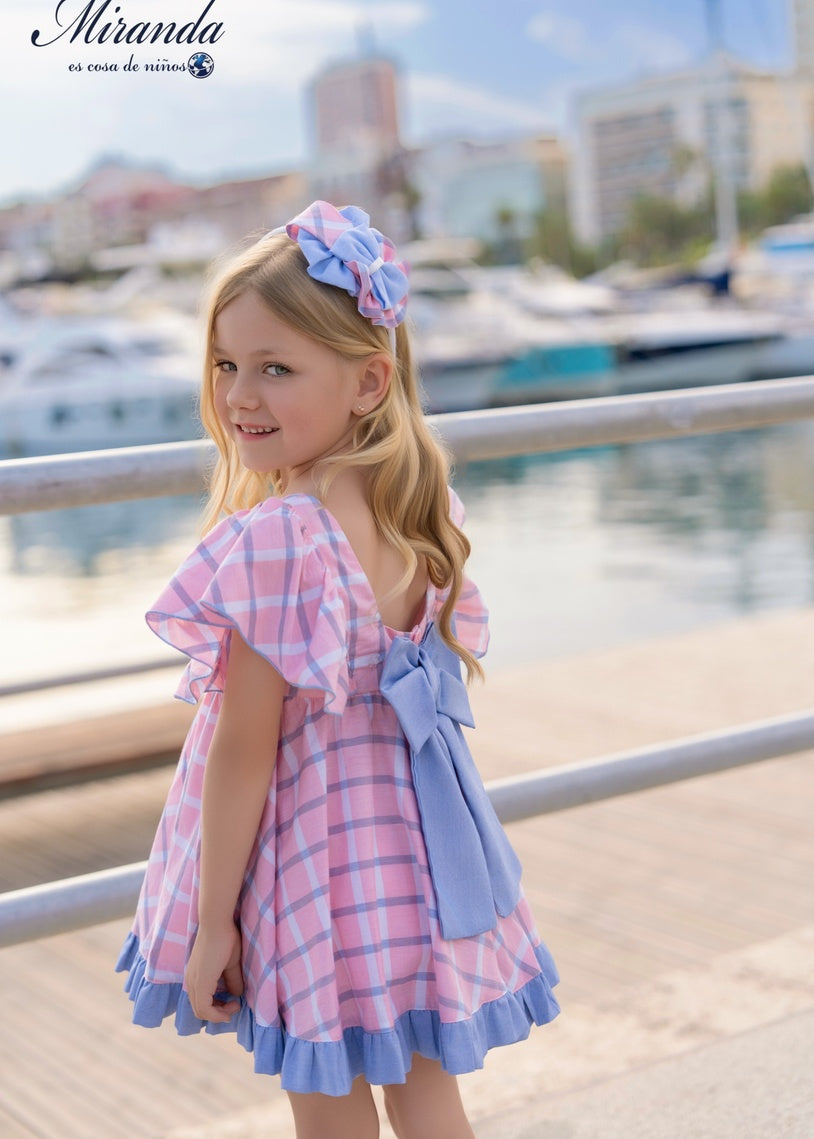 Vestido niña rosa con cuadros y lazo trasero, vista frontal