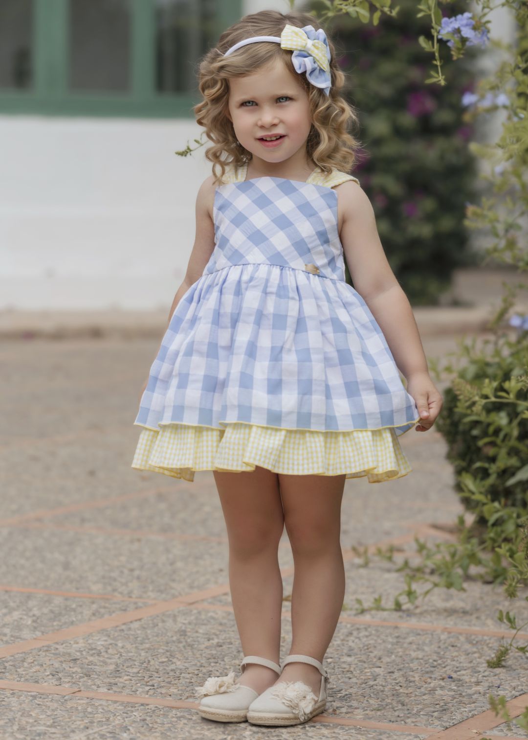 Vestido azul Miranda 0622 con lazo y volantes para niñas